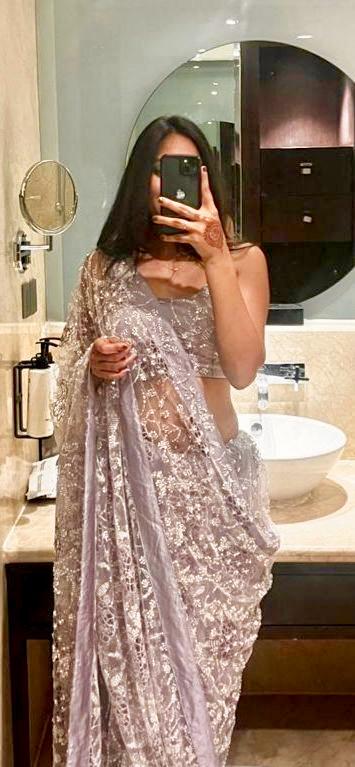 fashion design mood board with fabric swatches, sketches, and antique sewing tools