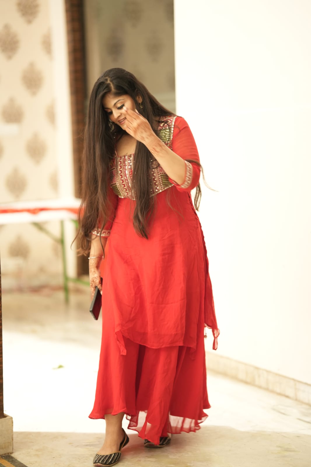 fashion design mood board with fabric swatches, sketches, and antique sewing tools