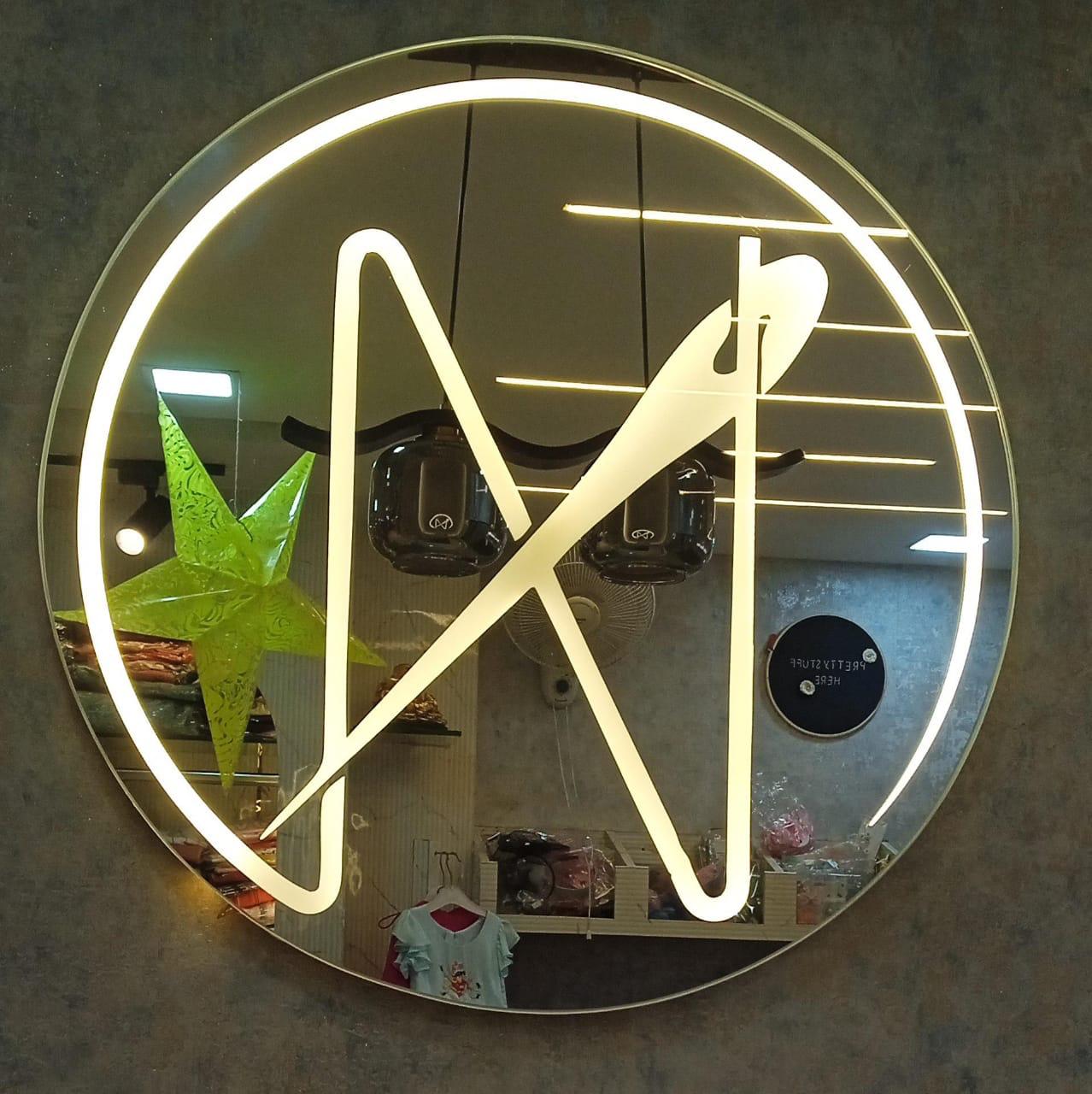 Professional boutique atelier showing luxury fabrics and design tools